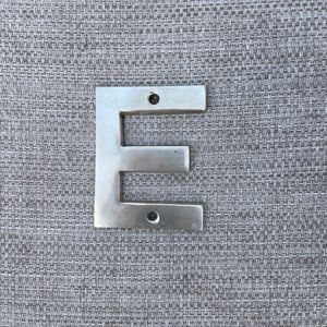 Vintage “E” solid brass letter